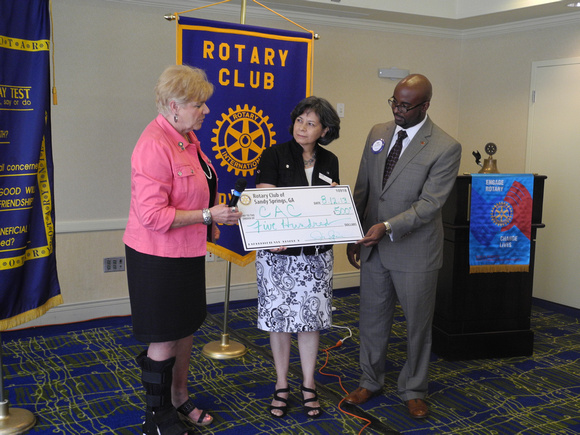 Pictured: l-r Rotary Club of Sandy Springs members Fran Farias, Tamara Carrera (Executive Director, CAC), Cory Jackson and Jim Squire